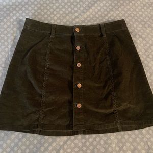 Celebrity pink mini skirt size 13 dark green